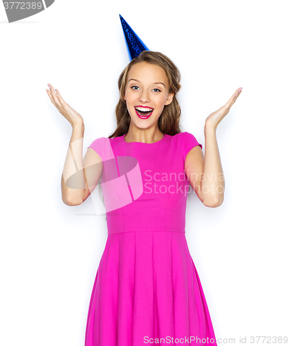 Image of happy young woman or teen girl in party cap