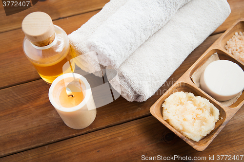 Image of close up of natural cosmetics and bath towels