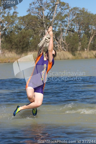 Image of girl swinging