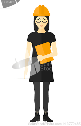 Image of Woman holding tablet computer.