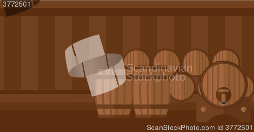 Image of Background of wine barrels in cellar.