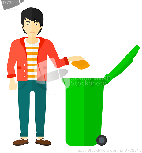 Image of Man throwing trash.