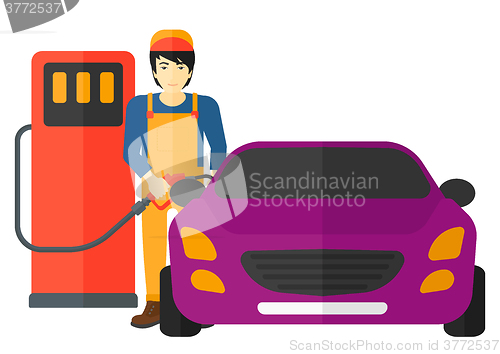 Image of Man filling up fuel into car.