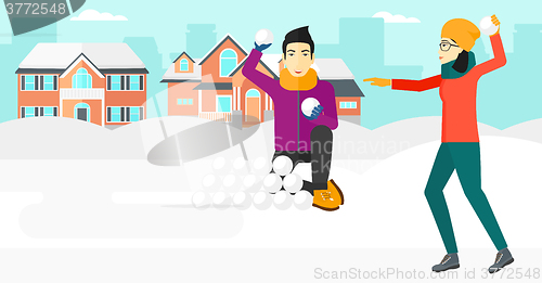 Image of Couple playing in snowballs.