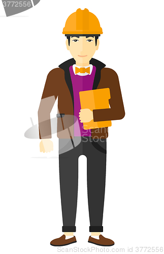Image of Man holding tablet computer.