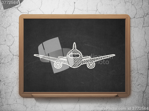 Image of Tourism concept: Aircraft on chalkboard background