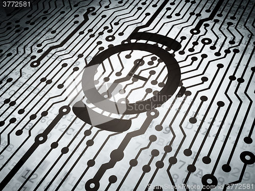 Image of Time concept: circuit board with Hand Watch