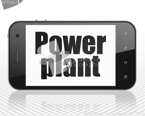 Image of Manufacuring concept: Smartphone with Power Plant on display