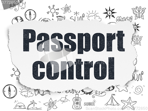 Image of Vacation concept: Passport Control on Torn Paper background