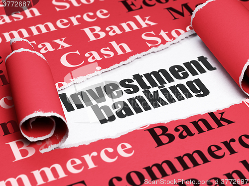 Image of Money concept: black text Investment Banking under the piece of  torn paper