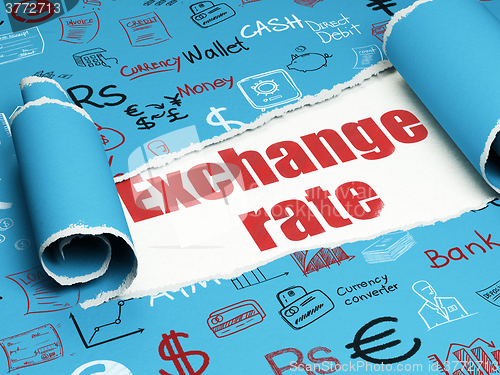 Image of Currency concept: red text Exchange Rate under the piece of  torn paper