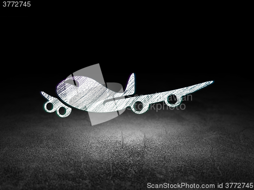 Image of Vacation concept: Airplane in grunge dark room