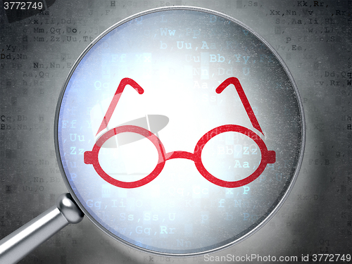 Image of Studying concept: Glasses with optical glass on digital background