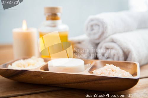 Image of close up of soap, himalayan salt and scrub in bowl