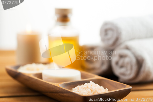 Image of close up of soap, himalayan salt and scrub in bowl