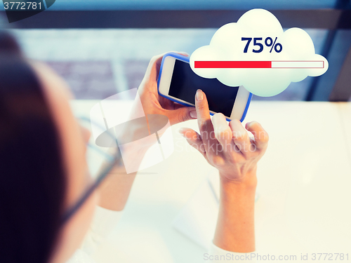 Image of close up of woman with smartphone cloud computing