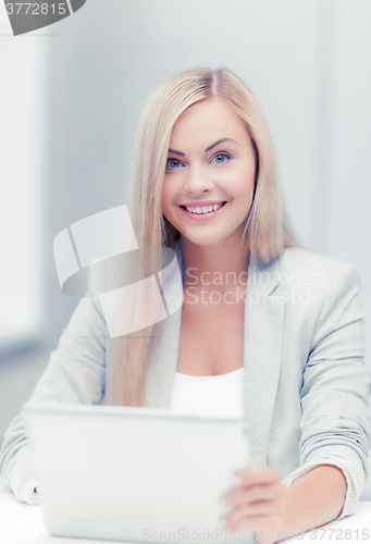 Image of businesswoman with laptop