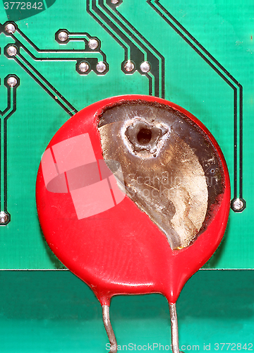 Image of MOV, Metal Oxide Varistor burnt by thunder and lightning.