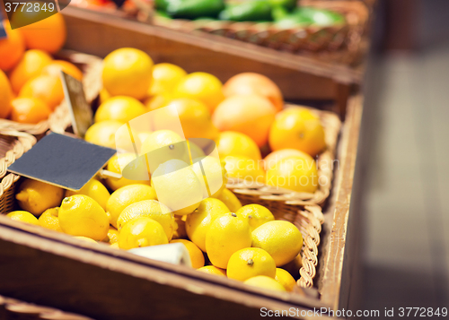 Image of ripe lemons at food market