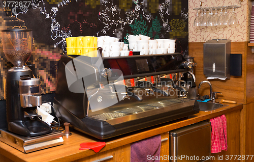 Image of close up of coffee machine at cafe or restaurant