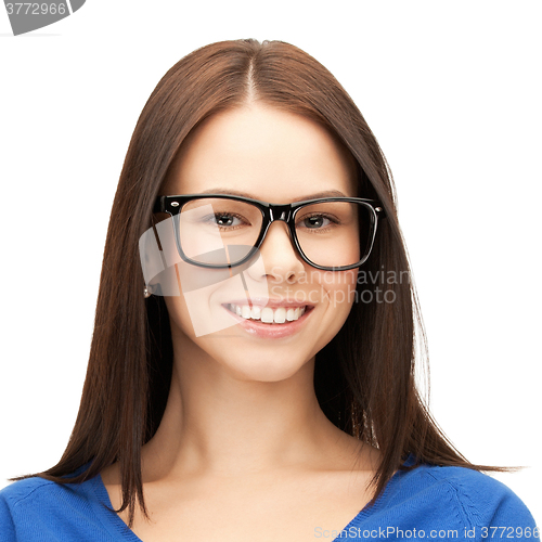 Image of happy smiling young woman face in glasses