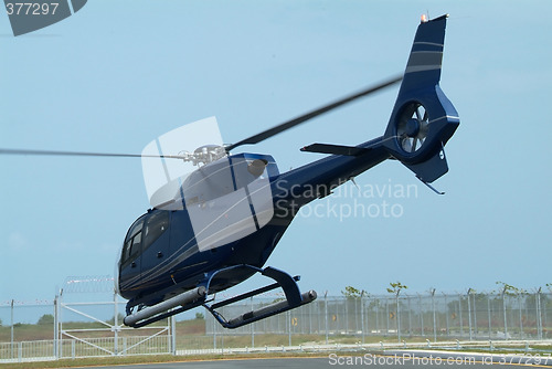 Image of Dark blue helicopter