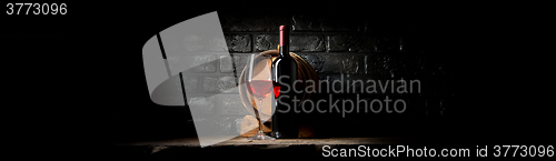 Image of Wine on black bricks