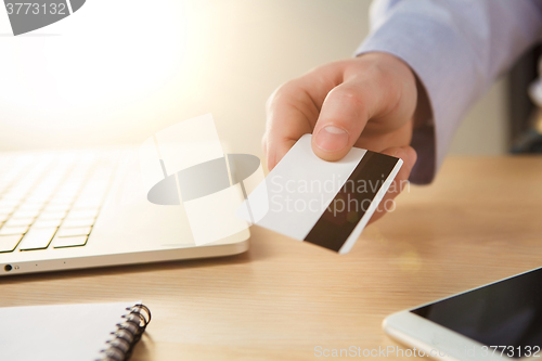 Image of The man doing online shopping with credit card 