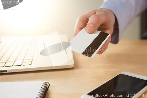 Image of The man doing online shopping with credit card 