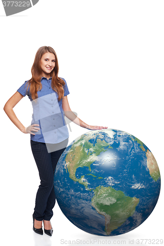 Image of Woman in full length with earth globe