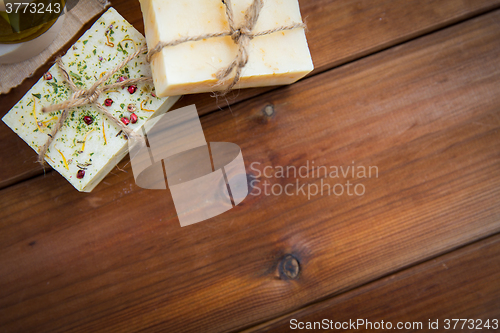 Image of close up of handmade soap bars on wood