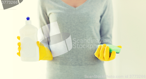 Image of close up of woman with sponge and cleanser