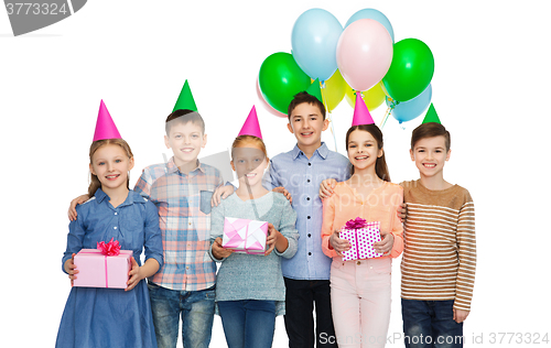 Image of happy children with gifts on birthday party