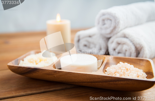 Image of close up of soap, himalayan salt and scrub in bowl