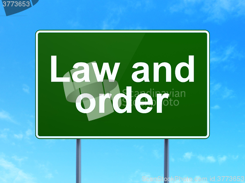 Image of Law concept: Law And Order on road sign background