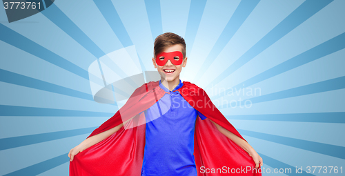 Image of boy in red super hero cape and mask