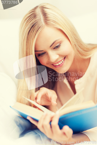 Image of woman reading book