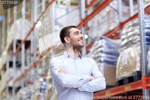 Image of happy man at warehouse