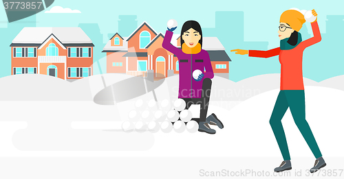 Image of Women playing in snowballs.