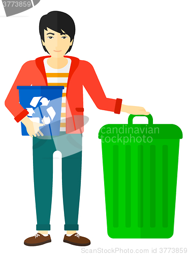 Image of Man with recycle bins.