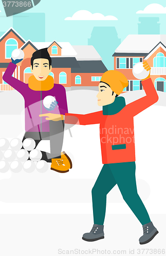 Image of Men playing in snowballs.