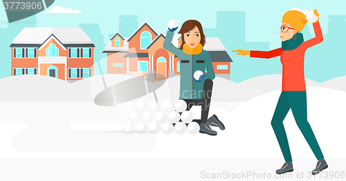 Image of Women playing in snowballs.