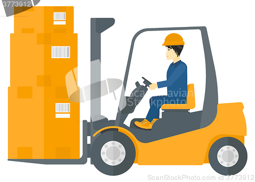 Image of Worker moving load by forklift truck.