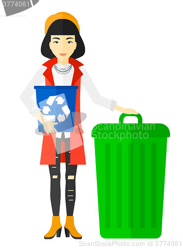 Image of Woman with recycle bins.