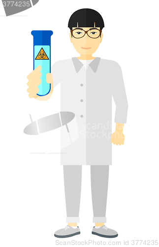 Image of Laboratory assistant with test tube.