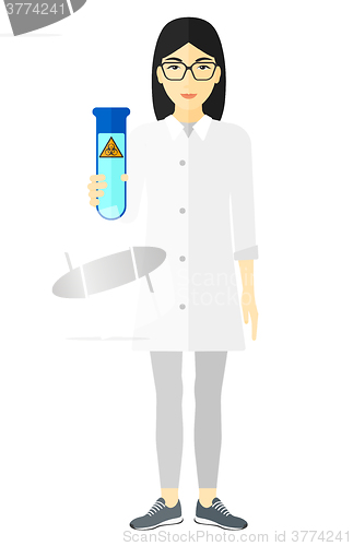 Image of Laboratory assistant with test tube.