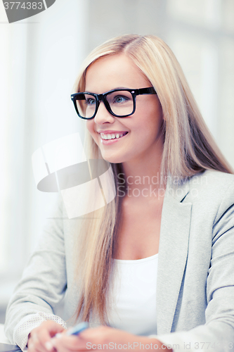 Image of businesswoman with glasses