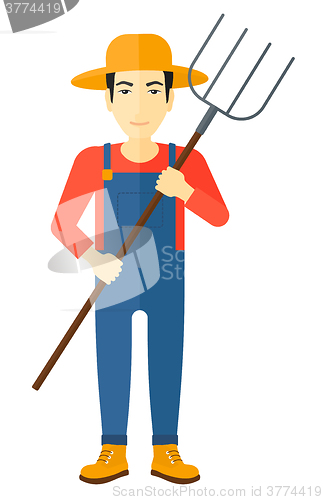 Image of Farmer with pitchfork.