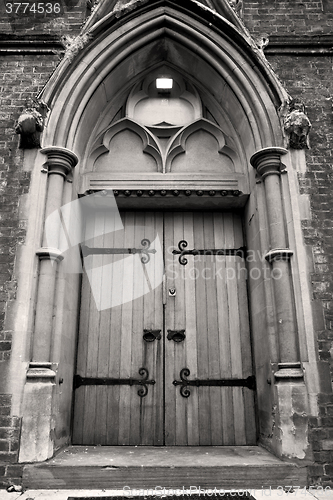 Image of wooden parliament in london old church door and marble antique  