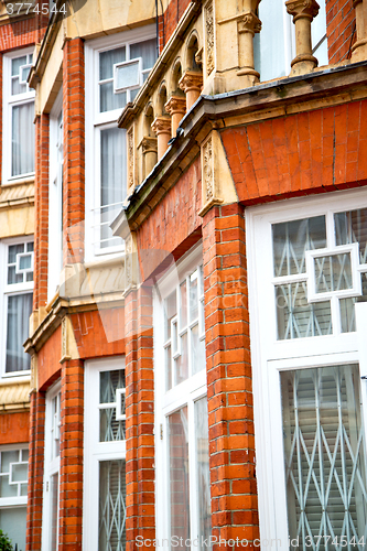 Image of in europe london old red brick wall and   window